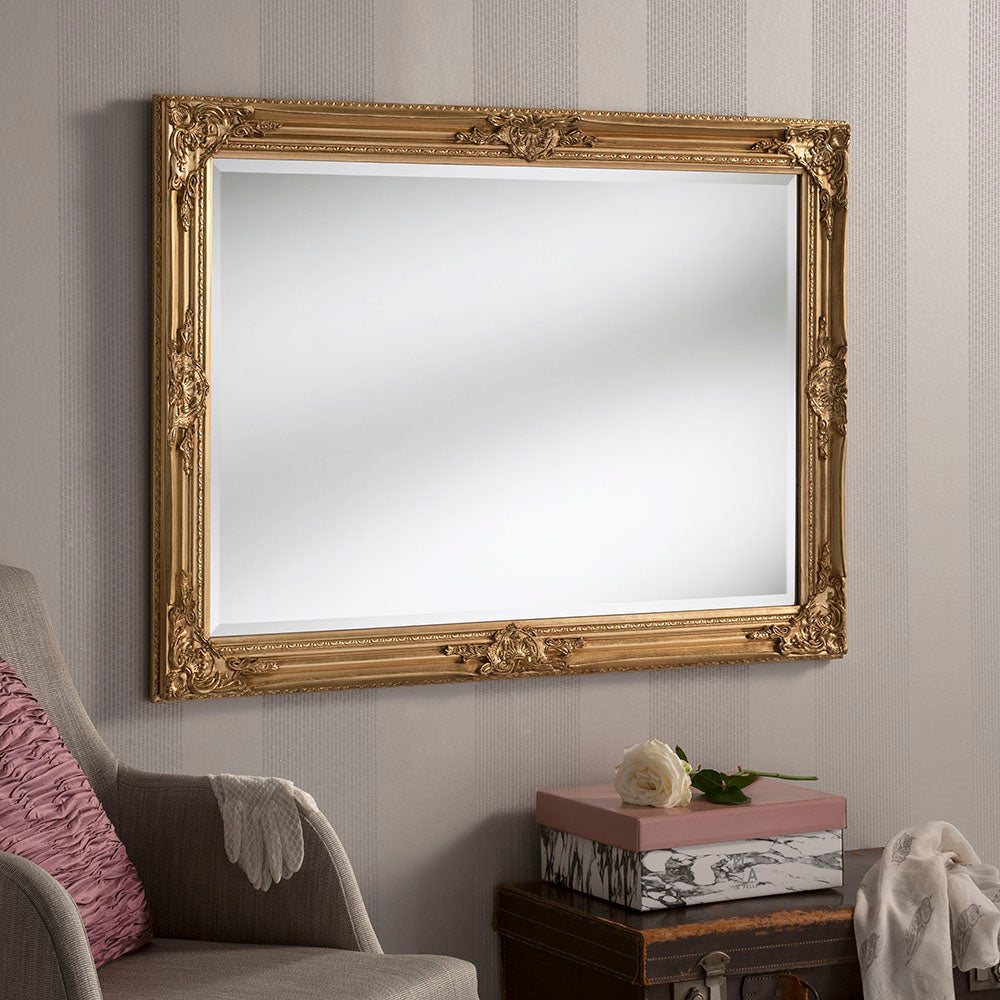 Traditional ornate rectangular salon wall mirror.