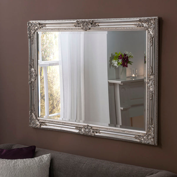 Traditional ornate rectangular salon wall mirror.