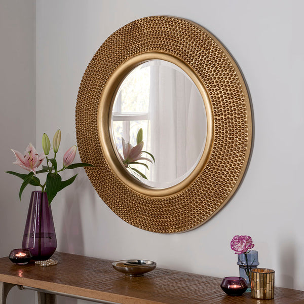Modern round decorative wall mirror.