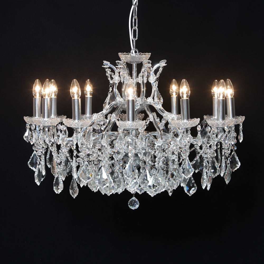 Lindy 12 branch large shallow crystal glass chandelier with chrome frame.