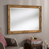 Traditional ornate rectangular salon wall mirror.