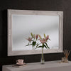 Traditional ornate rectangular salon wall mirror.