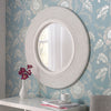 Modern round decorative wall mirror.